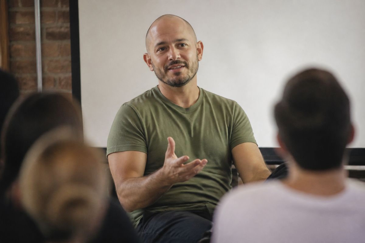Noah Kagan speaking at a startup workshop session