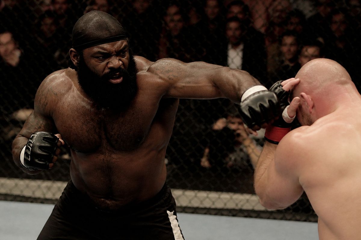 Kimbo Slice throwing a powerful punch in the octagon