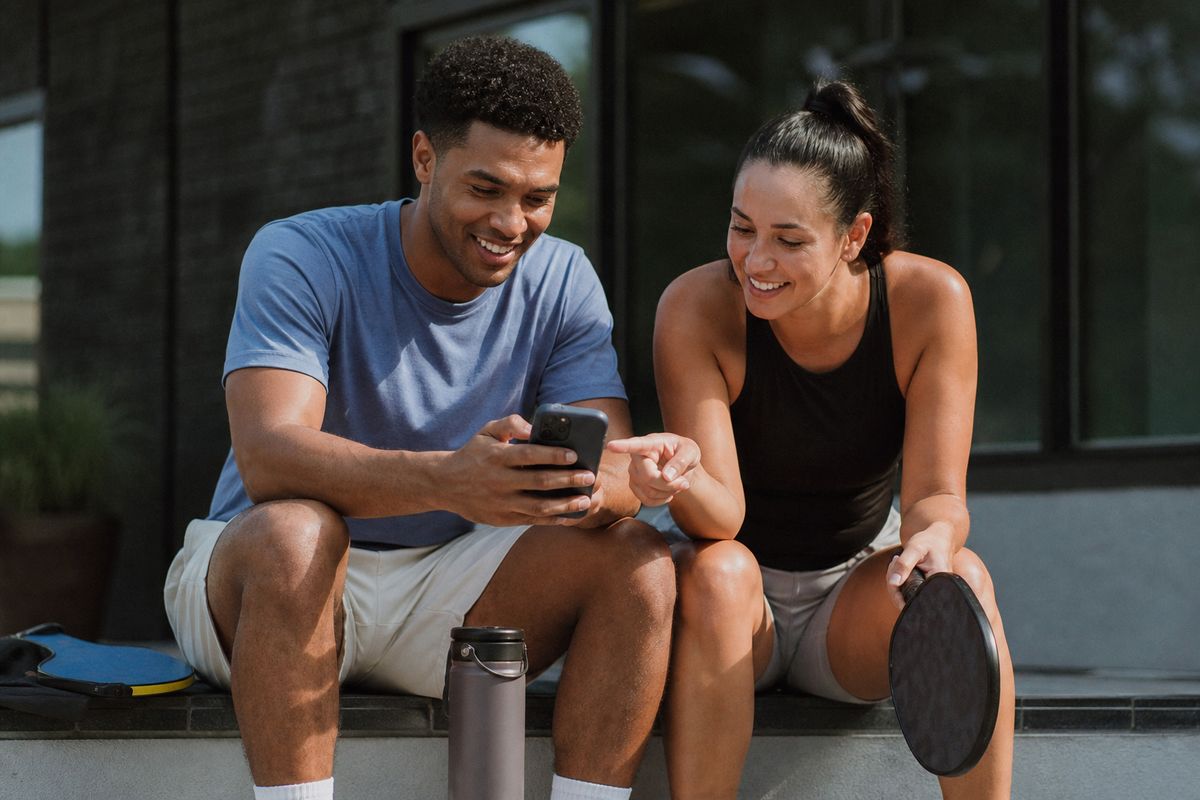 Players booking pickleball courts on a leisure center app