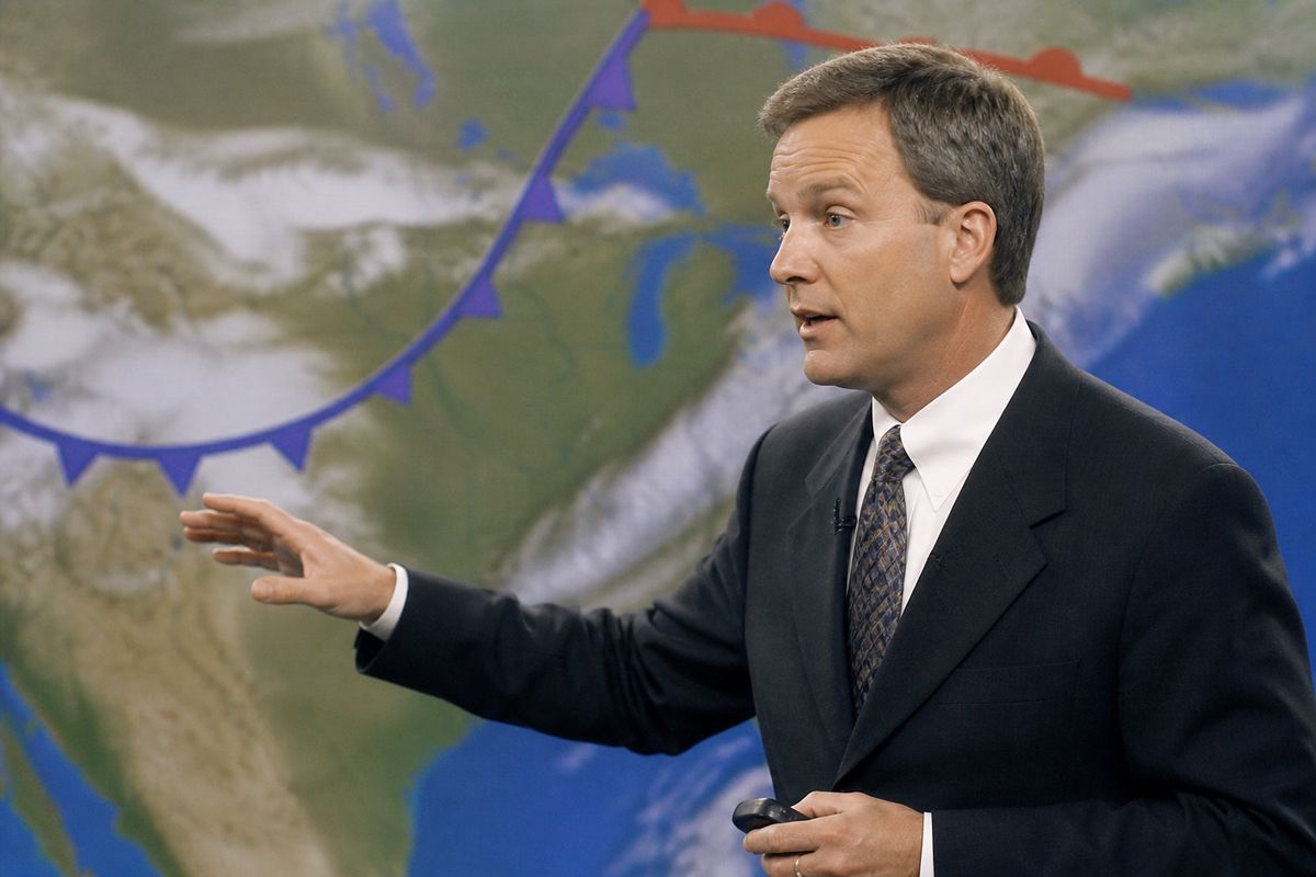A weather forecaster speaking on live television