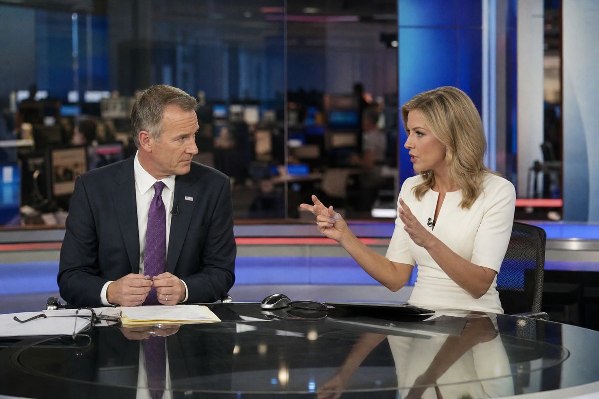 Sky Sports News studio with anchors delivering live broadcast