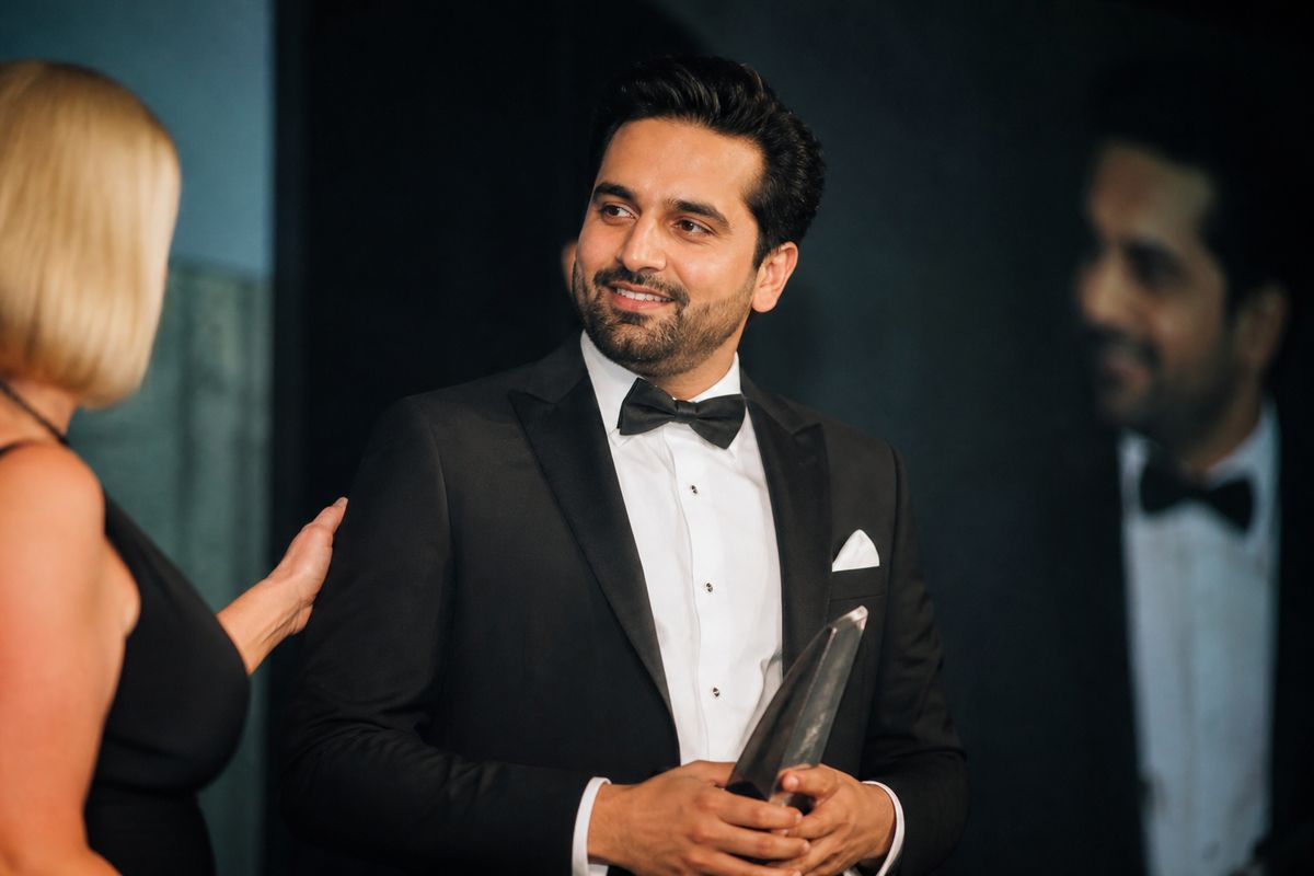 Varun Bhanout accepting the UK StartUp Award on stage